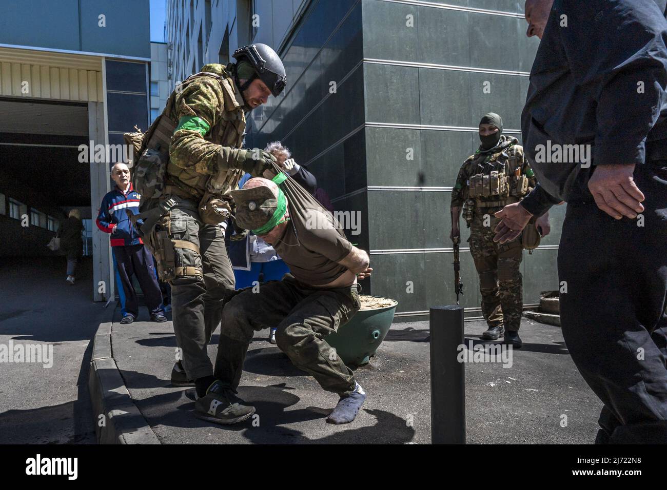 A Russian soldier is detained by Ukrainian Army while being yelled and berated by Ukrainians at a local hospital in Kharkiv, Ukraine, Thursday, May 5, 2022. The U.K. government has reportedly launched an inquiry into how British-manufactured components have made their way into Russian weapons systems, despite an arms embargo being in operation since Russia annexed Crimea in 2014.     Photo by Ken Cedeno/UPI Stock Photo