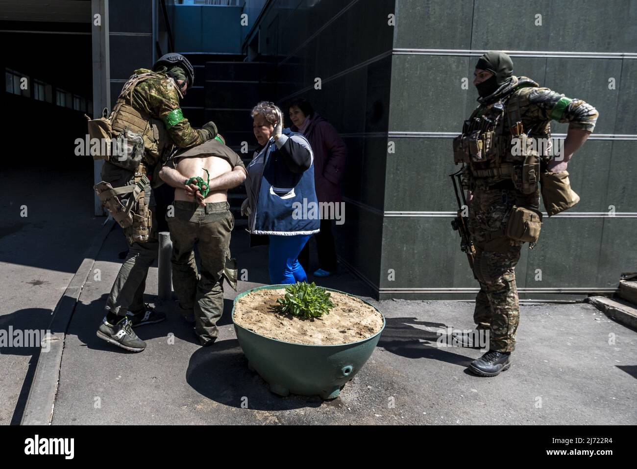A Russian soldier is detained by Ukrainian Army while being yelled and berated by Ukrainians at a local hospital in Kharkiv, Ukraine, Thursday, May 5, 2022. The U.K. government has reportedly launched an inquiry into how British-manufactured components have made their way into Russian weapons systems, despite an arms embargo being in operation since Russia annexed Crimea in 2014.     Photo by Ken Cedeno/UPI Stock Photo