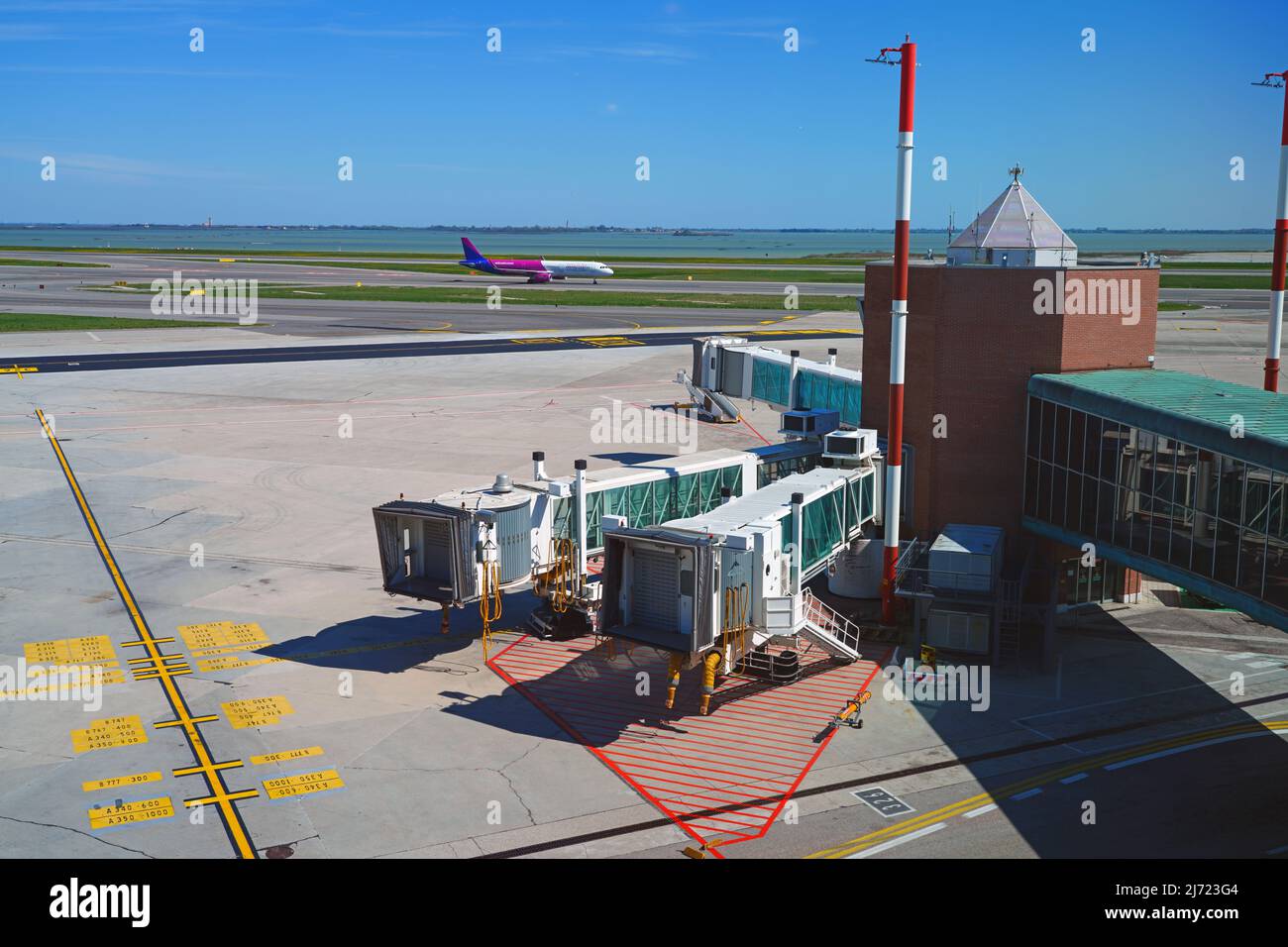 VENICE, ITALY -17 APR 2022- View of an airplane from Hungarian ultra low-cost airline Wizz Air (W6) at the Venice Marco Polo Airport (VCE), located on Stock Photo