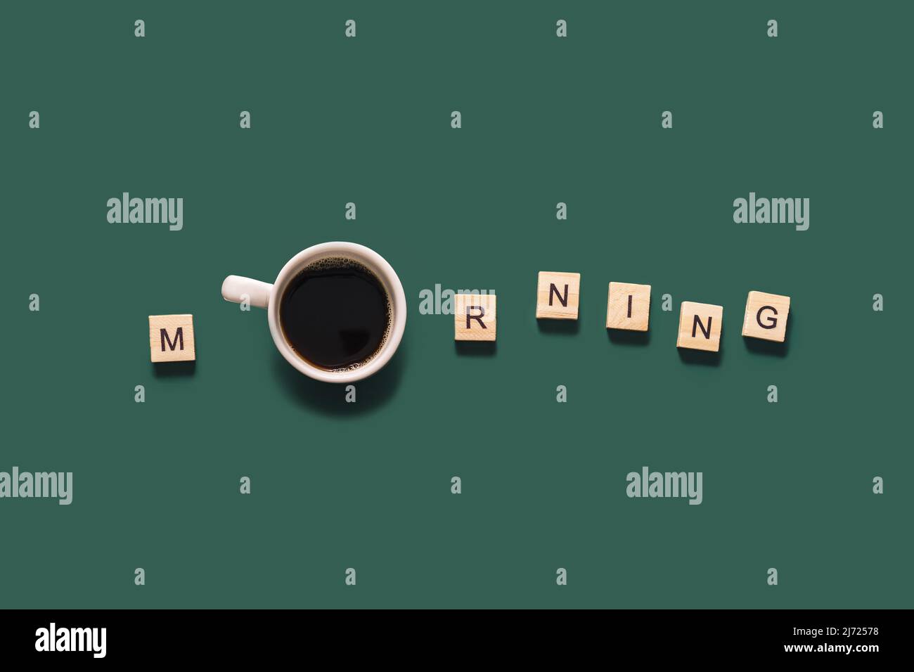 Word morning is lined with letters on green background Stock Photo