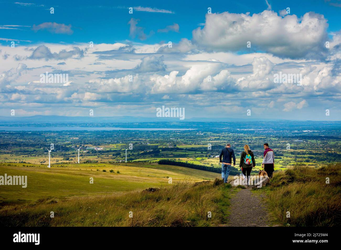 Three walkers on the Belfast Hills, Black Mountain, Belfast, Northern Ireland Stock Photo