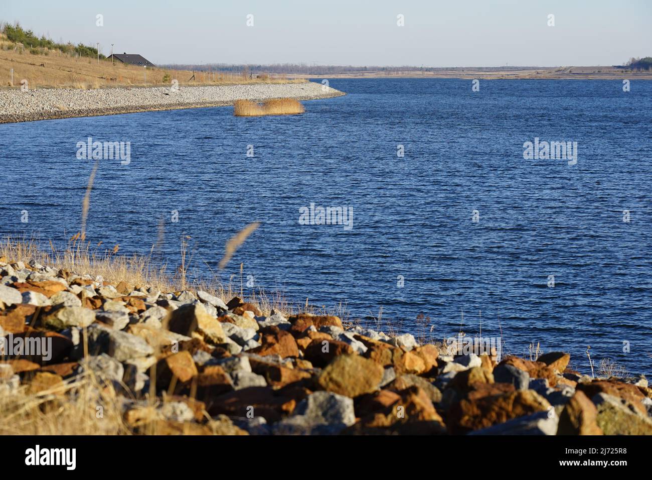 A former open-cast lignite mine becomes a lake after flooding Stock Photo -  Alamy