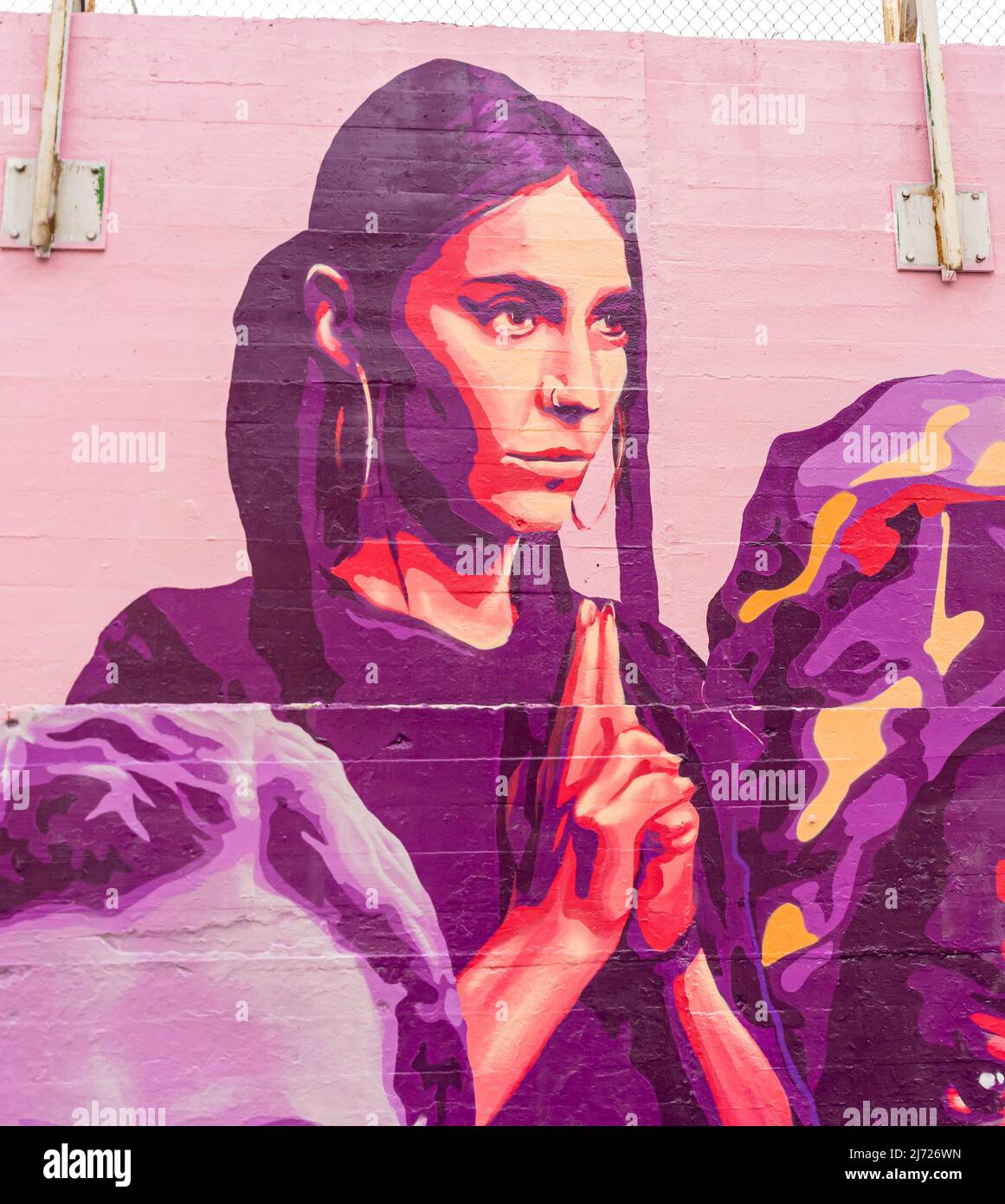 Mural of Spanish poet and rapper Gata Cattana, Concepcion feminist mural  La unión hace la fuerza,  on the wall in, Madrid Spain Stock Photo