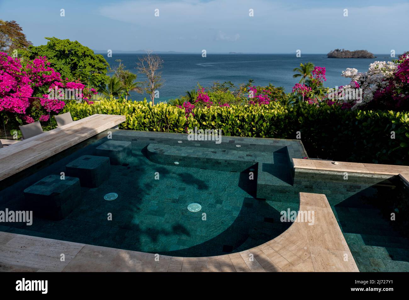 Villa in the tropics on the ocean pacific coast with an Infinity pool and view out to sea, Panama, Central America Stock Photo