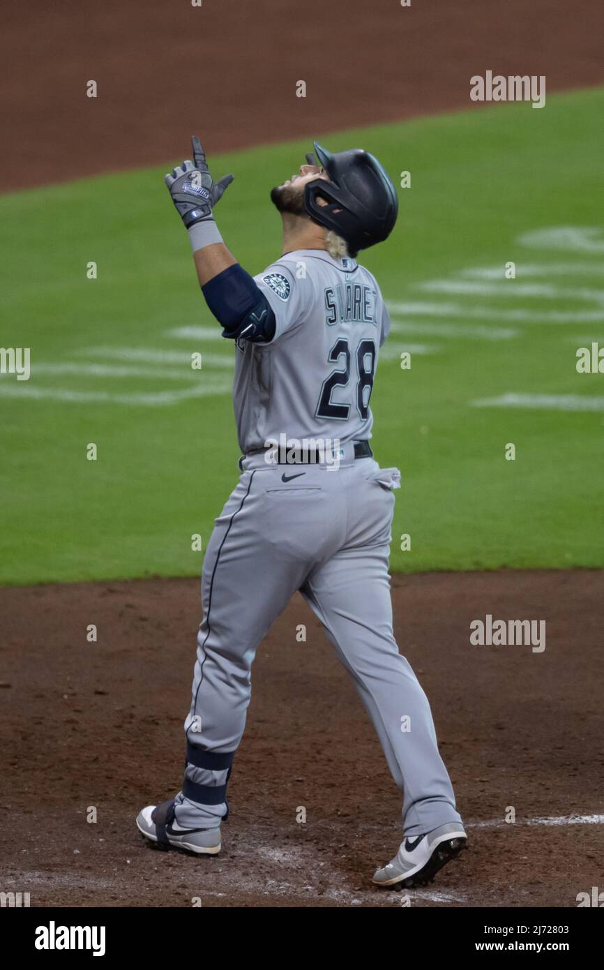 Seattle Mariners third baseman Eugenio Suarez (28) points skyward after  hitting a 2 run homerun in the seventh inning against the Houston Astros,  Wednesday, May 4, 2022, in Houston, Texas. The Astros
