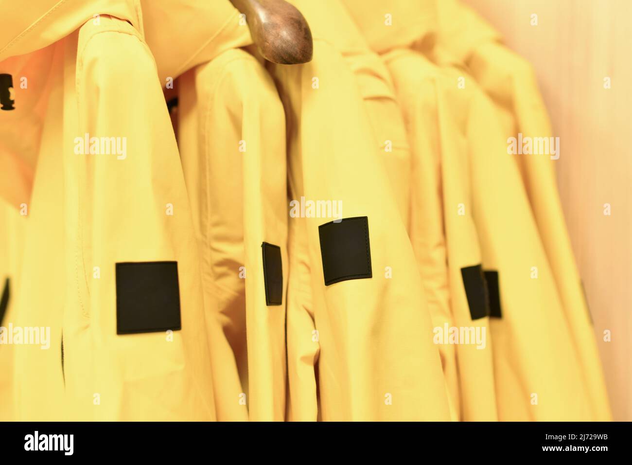 Yellow rain jackets hi-res stock photography and images - Alamy