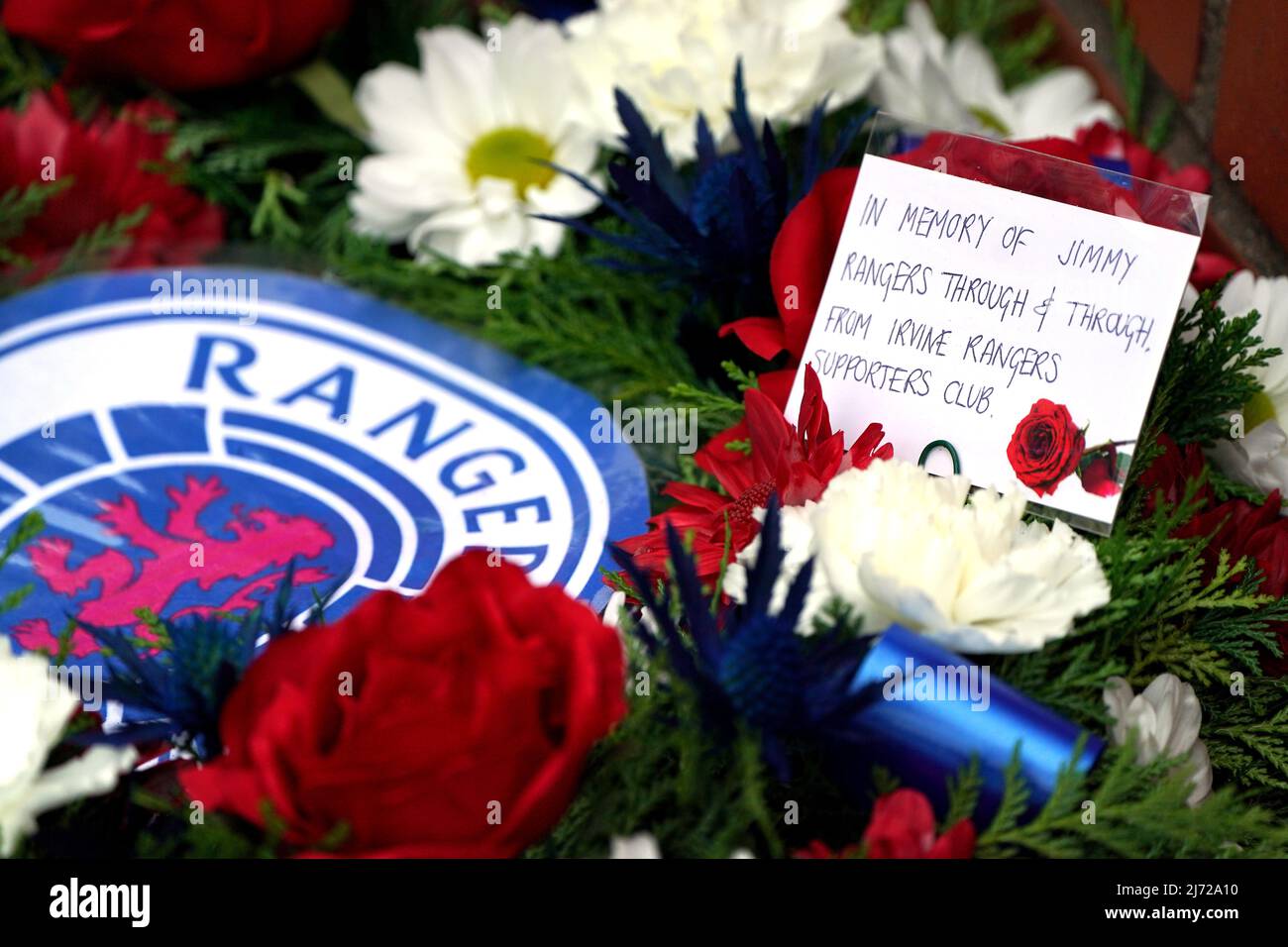 Tributes are placed outside in memory of former Rangers kit man Jimmy
