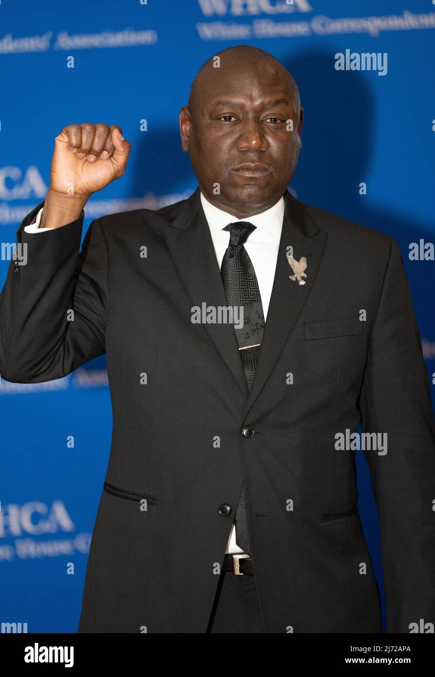Attorney Benjamin Crump posed with the 'Black Power' handsign, on the