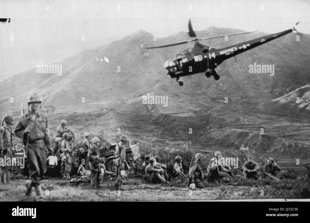 Front Line Liason -- A U.S. Marines' helicopter takes off from a marine forward command post near the Korean front. The plane is used as a liaison unit between front line positions and the First Marine Division base. August 15, 1950. (Photo by AP Wirephoto). Stock Photo
