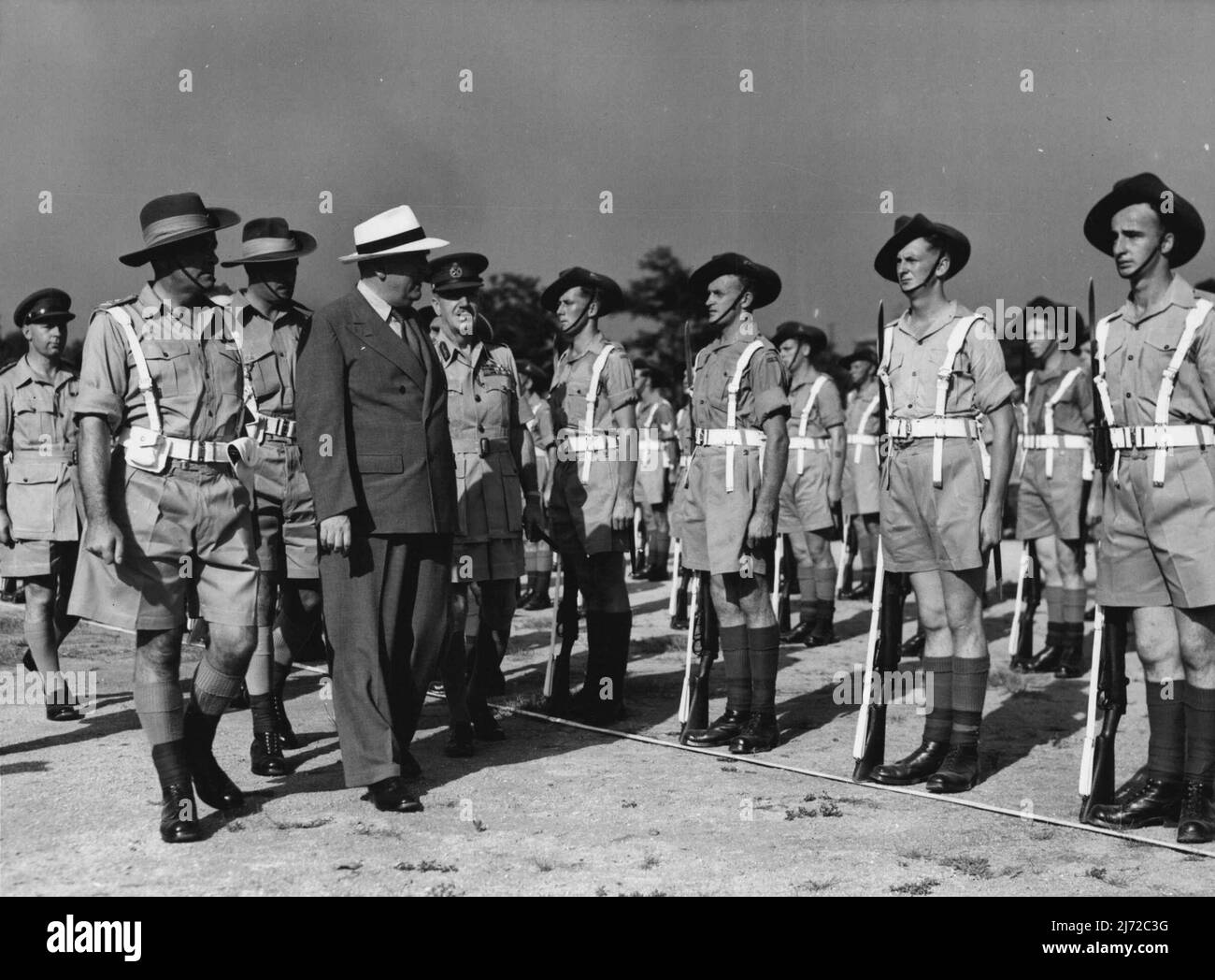 The Rt. Hon R.G. Menzies inspecting troops of Royal Aust. Army Service Corps. Left to right; Lt. Col. Fairclough commanding officer RAASC Lt-Col. F.S. Walsh Parade Commander. The Rt. Hon. R.G. Menzies, C-in-C BCOF Lt. Gen. Sir Horace Robertson. The Australian Prime minister, The Rt. Hon. R.G. Menzies, today inspected troops of the British Commonwealth Occupations Force at a parade on Anzac Park, Kure, Japan, on 16 August '50. August 16, 1950. (Photo by Public Relations Section HQ BCOF). Stock Photo