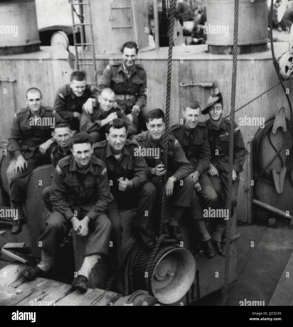 The Warriors. This squad of 11 diggers from all over Australia have formed themselves into a special gang. They call themselves the Warriors. Picture was taken on board the American ship Aiken Victory, while the Australians were, on their way to Korea. October 2, 1950. Stock Photo