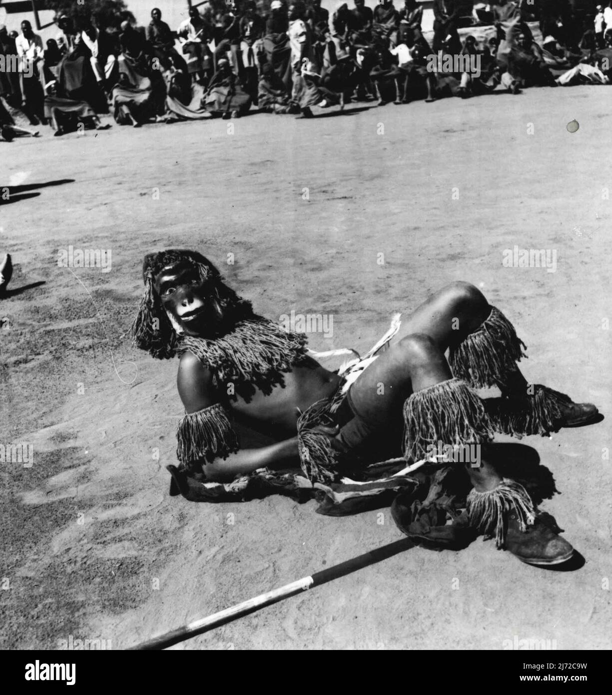 'Look Out For Natives: - Skin-Deep Civilization In Johannesburg, South Africa. Zulu dance in native miners' compound. Some of the dances require grotesque masks. March 26, 1938. (Photo by Pix Publishing Inc.). Stock Photo