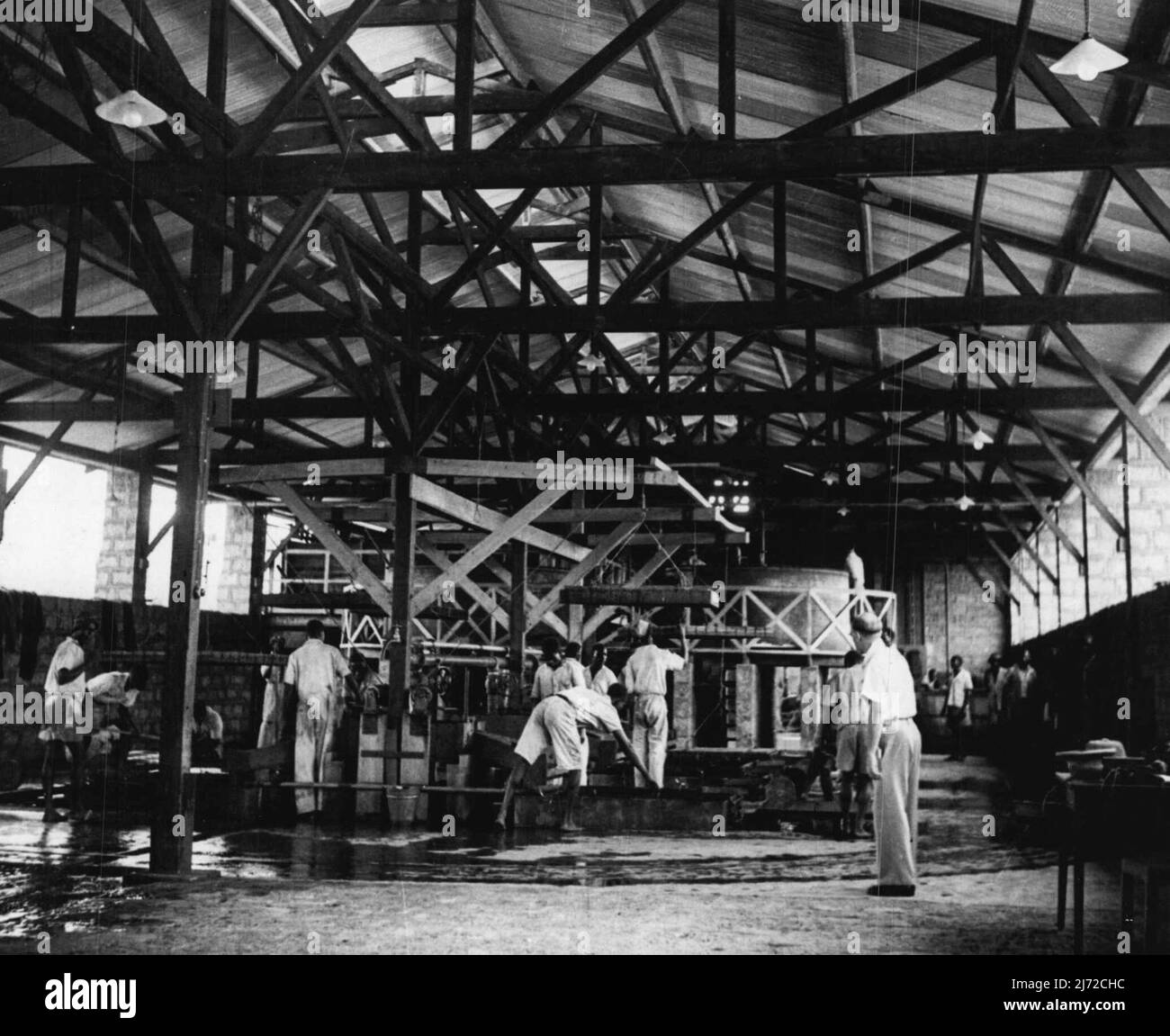 Fiber Board Factory - Thika, E. Africa -- General view of laying the table section of the plant. One of a series taken at the East African Industrial Management Board's Fibre Board factory at Thika. September 1, 1951. (Photo by British Official Photograph). Stock Photo