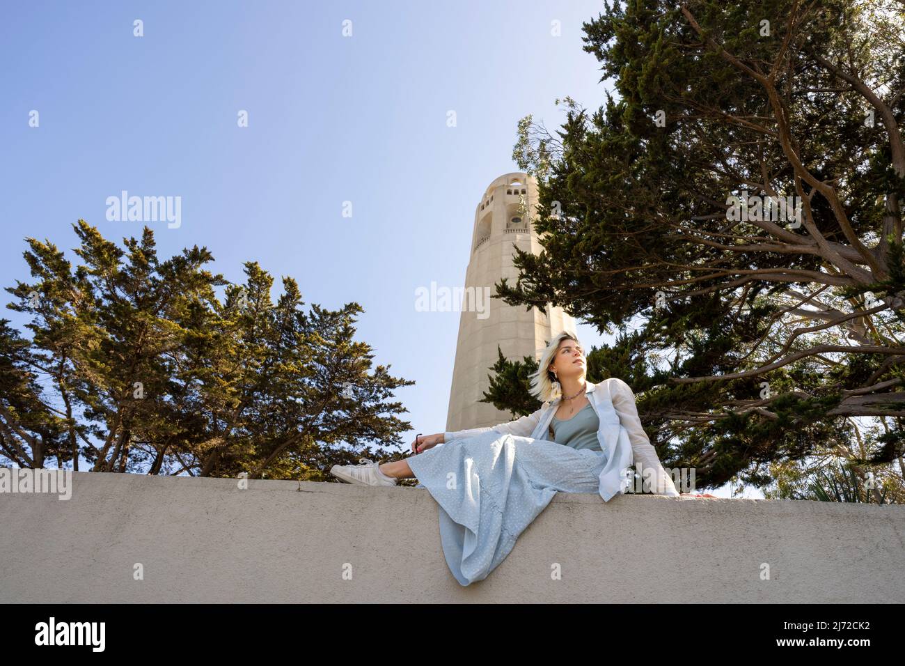 Young Woman Visiting Coit Tower in San Francisco | Lifestyle Tourism Stock Photo