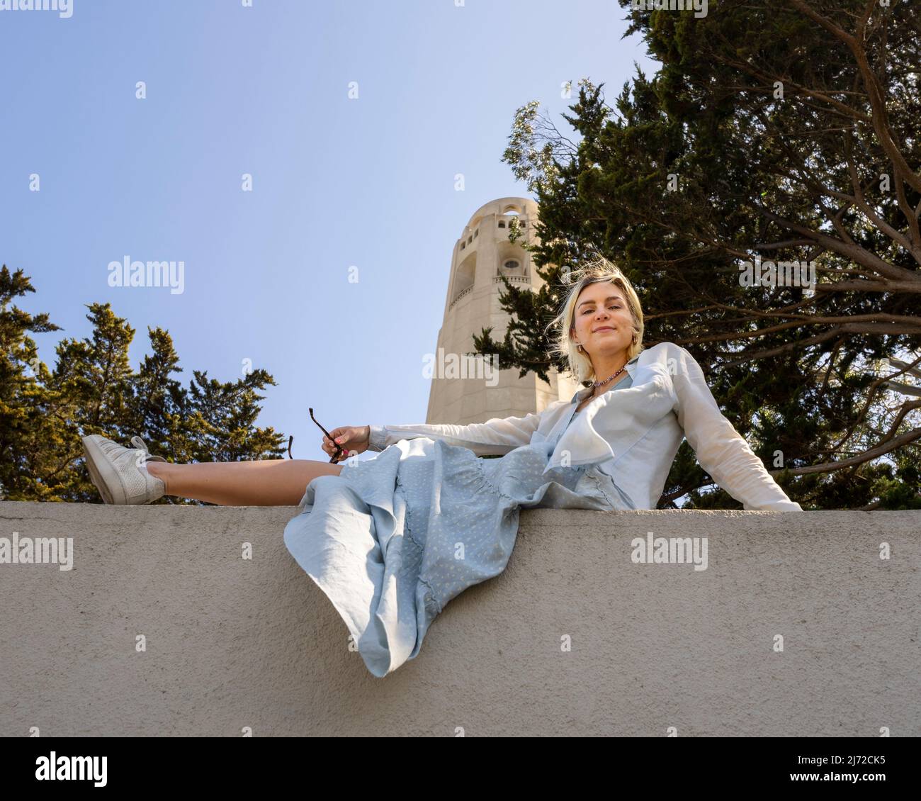 Young Woman Visiting Coit Tower in San Francisco | Lifestyle Tourism Stock Photo