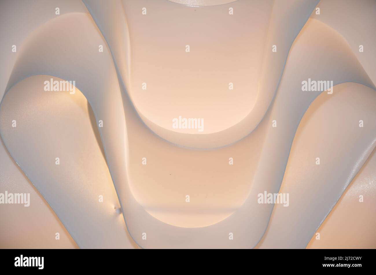 Abstract Taupe Beige light Smooth Curves Background Design on my chandelier Stock Photo