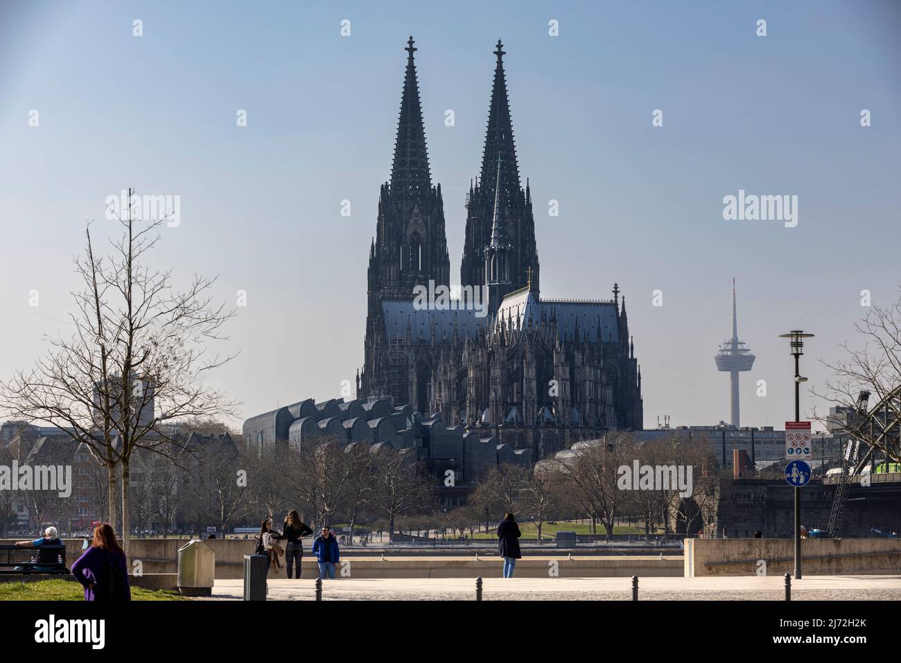 Cologne Cathedral twin towers rising above city skyline on a bright ...