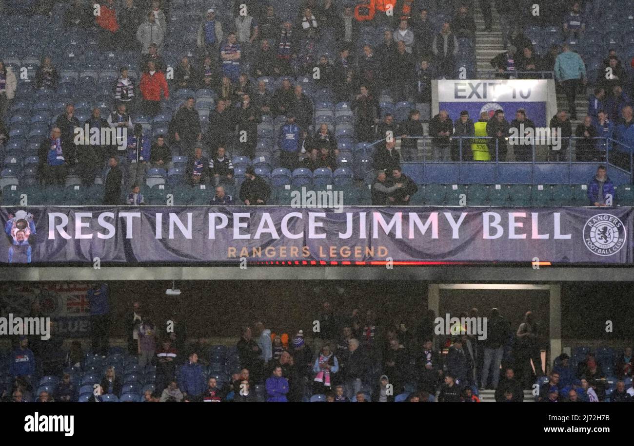 A banner in memory of former Rangers kit man Jimmy Bell, who died aged