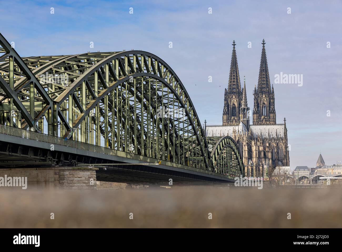 Cologne Cathedral twin towers rising above city skyline on a bright ...