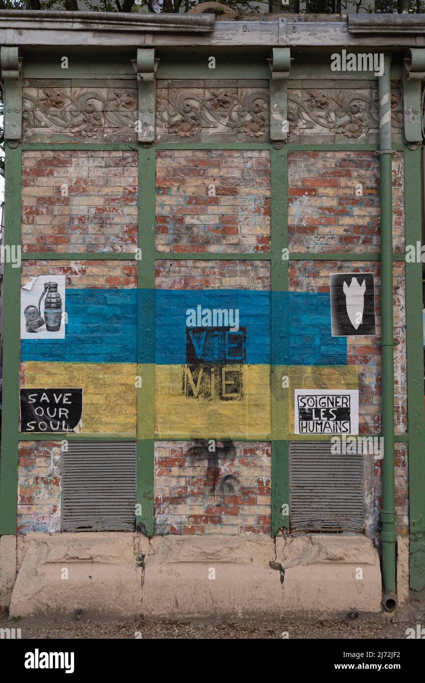 Ukrainian flag painted on a brick wall Stock Photo