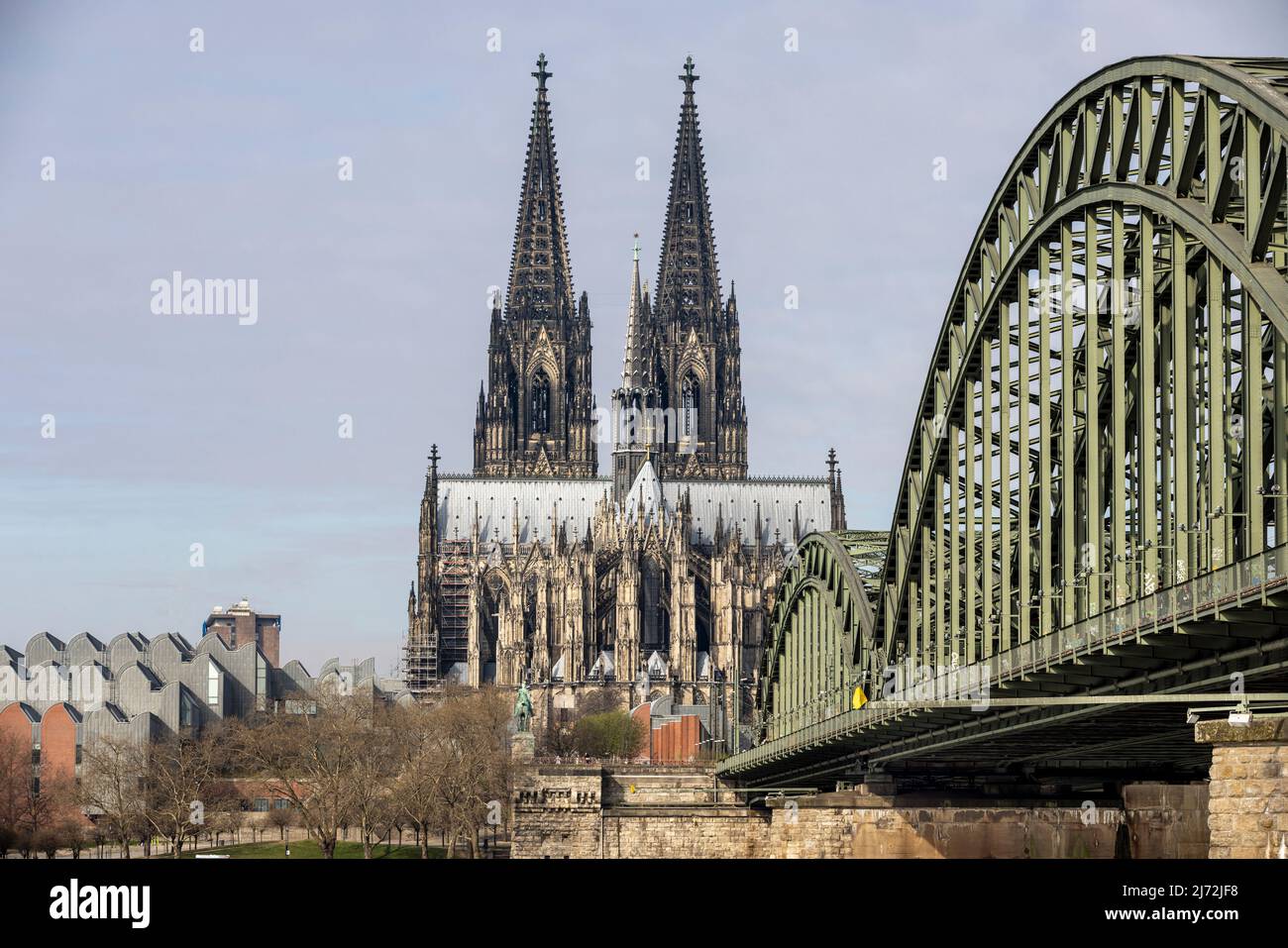 Cologne Cathedral twin towers rising above city skyline on a bright ...
