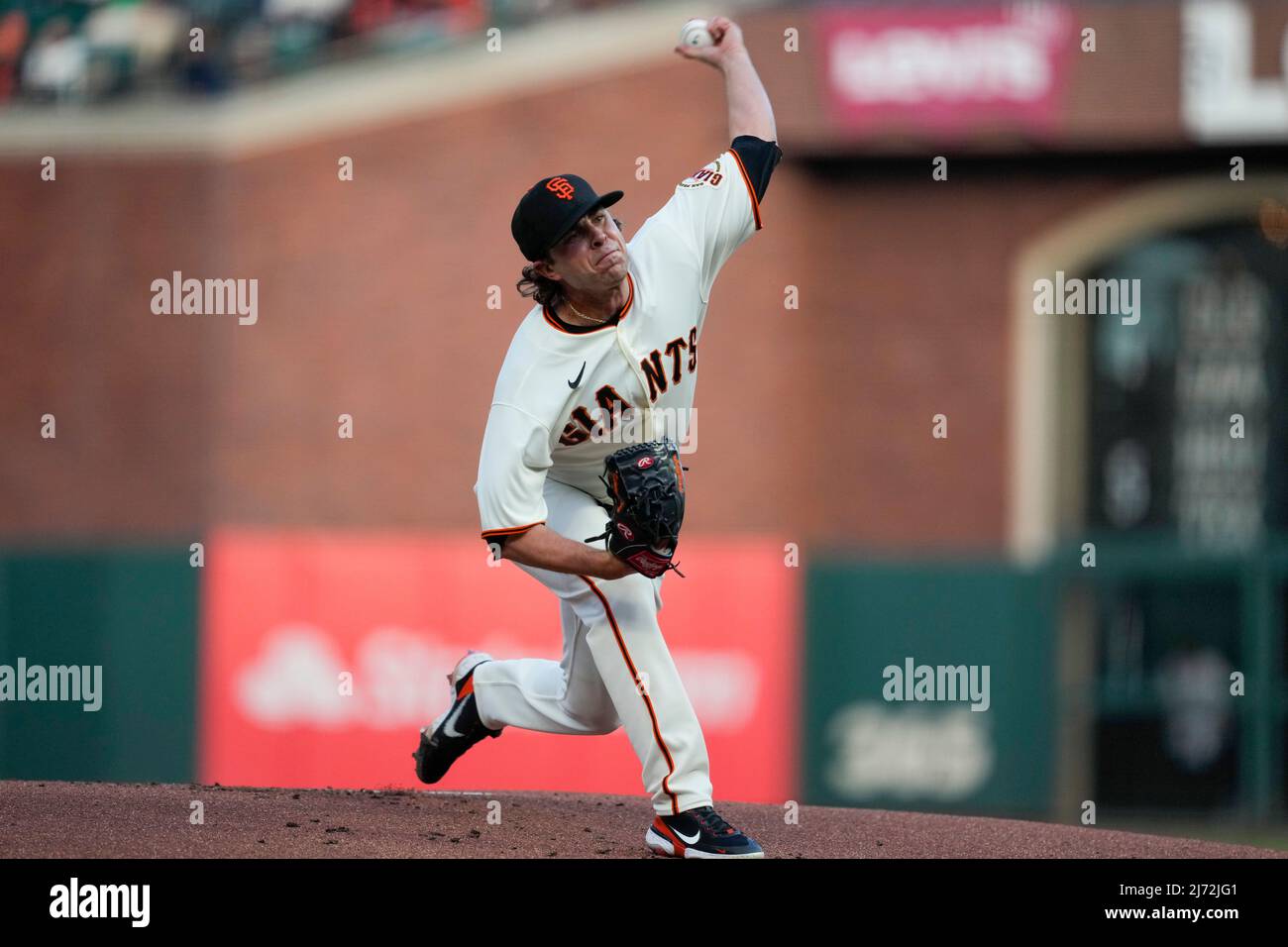 San Francisco Giant pitcher Sam Long (73) throws a pitch during MLB