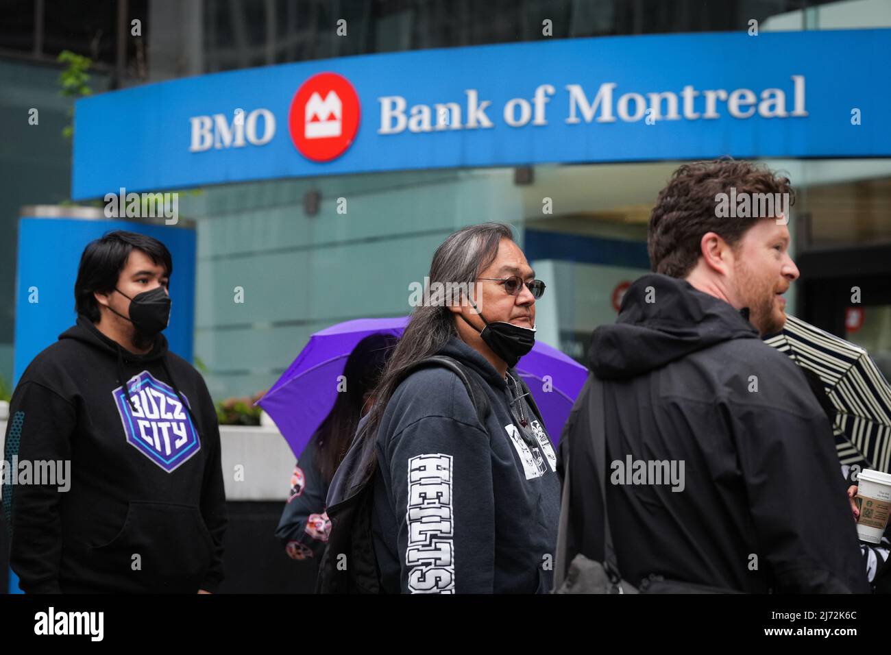 Maxwell Johnson, centre, a Heiltsuk First Nation member who was arrested alongside his 14year