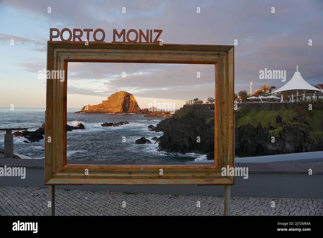 Picture frame window to Ilhéu Mole in the City Porto Moniz, Madeira, Portugal, Europe. Photo by Willy Matheisl Stock Photo