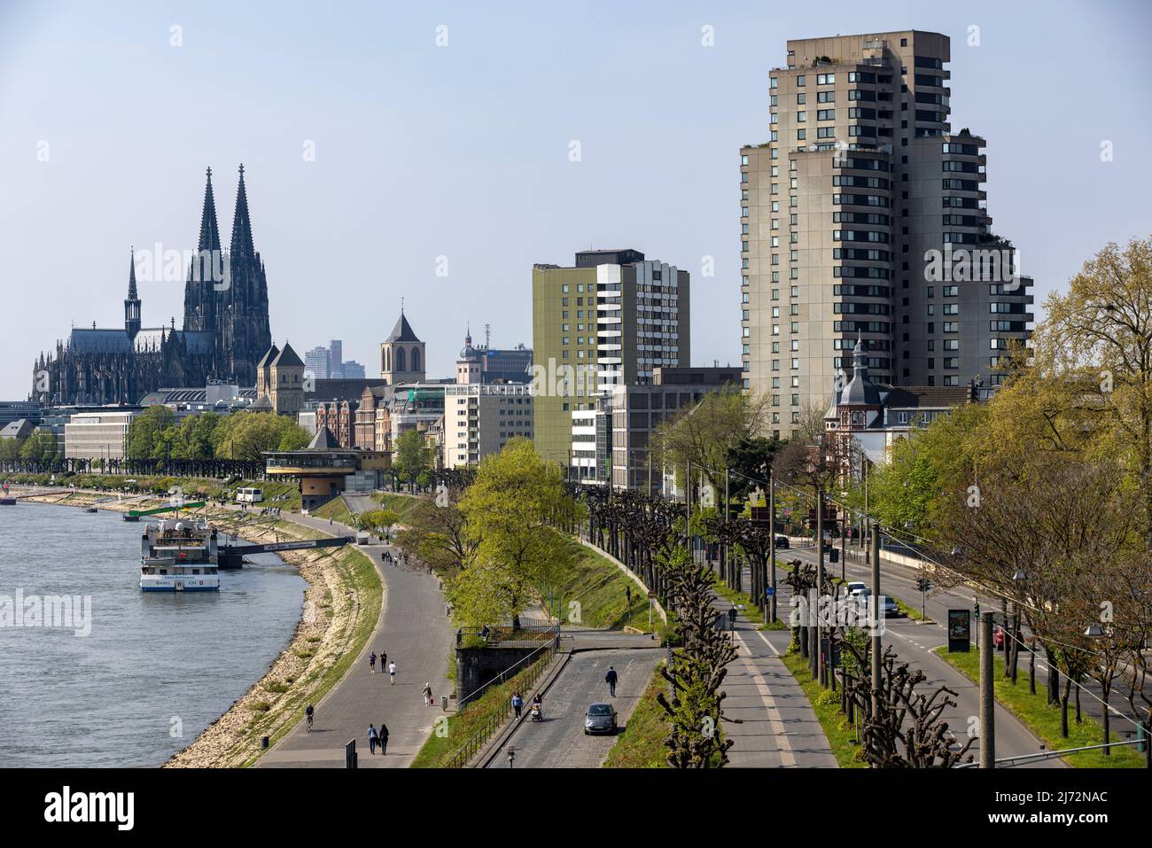 Cologne Cathedral twin towers rising above city skyline on a bright ...