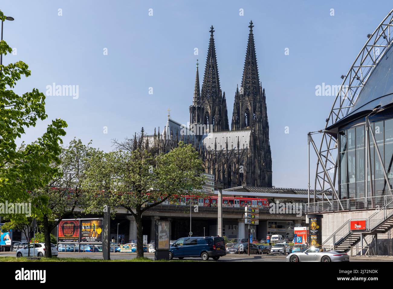 Cologne Cathedral twin towers rising above city skyline on a bright ...