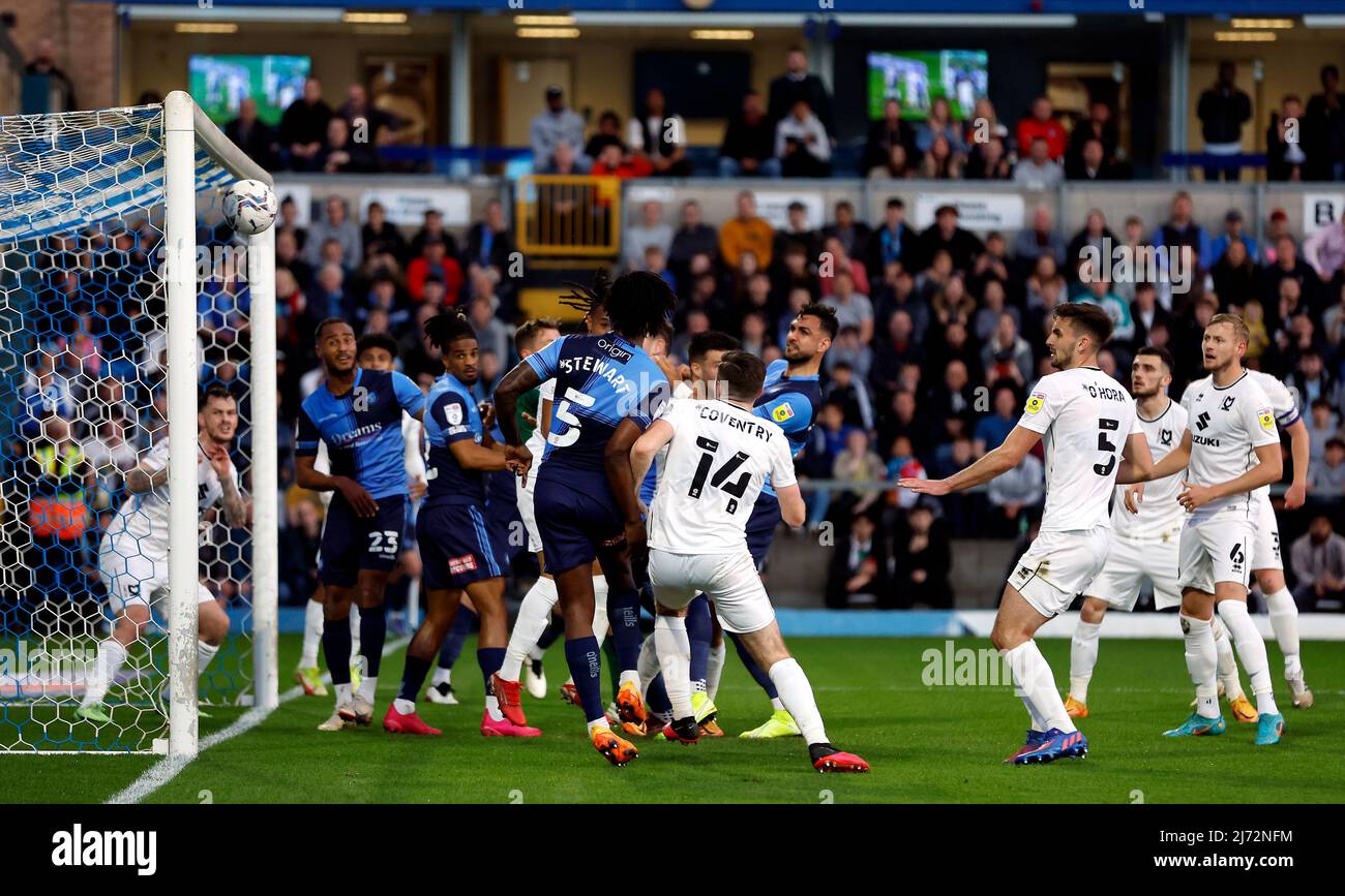 Wycombe Wanderers Ryan Tafazolli scores their side's first goal of the game during the Sky Bet League One play-off semi-final, first leg match at Adams Park, High Wycombe. Picture date: Thursday May 5, 2022. Stock Photo