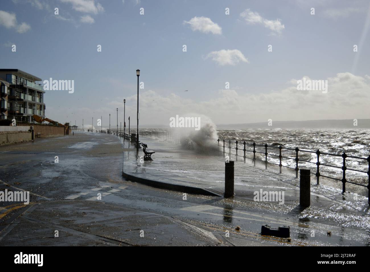WEST KIRBY. WIRRAL. ENGLAND. 03-12-20.  South Parade, the Marine Lake completely wamped by the swollen tides. Stock Photo