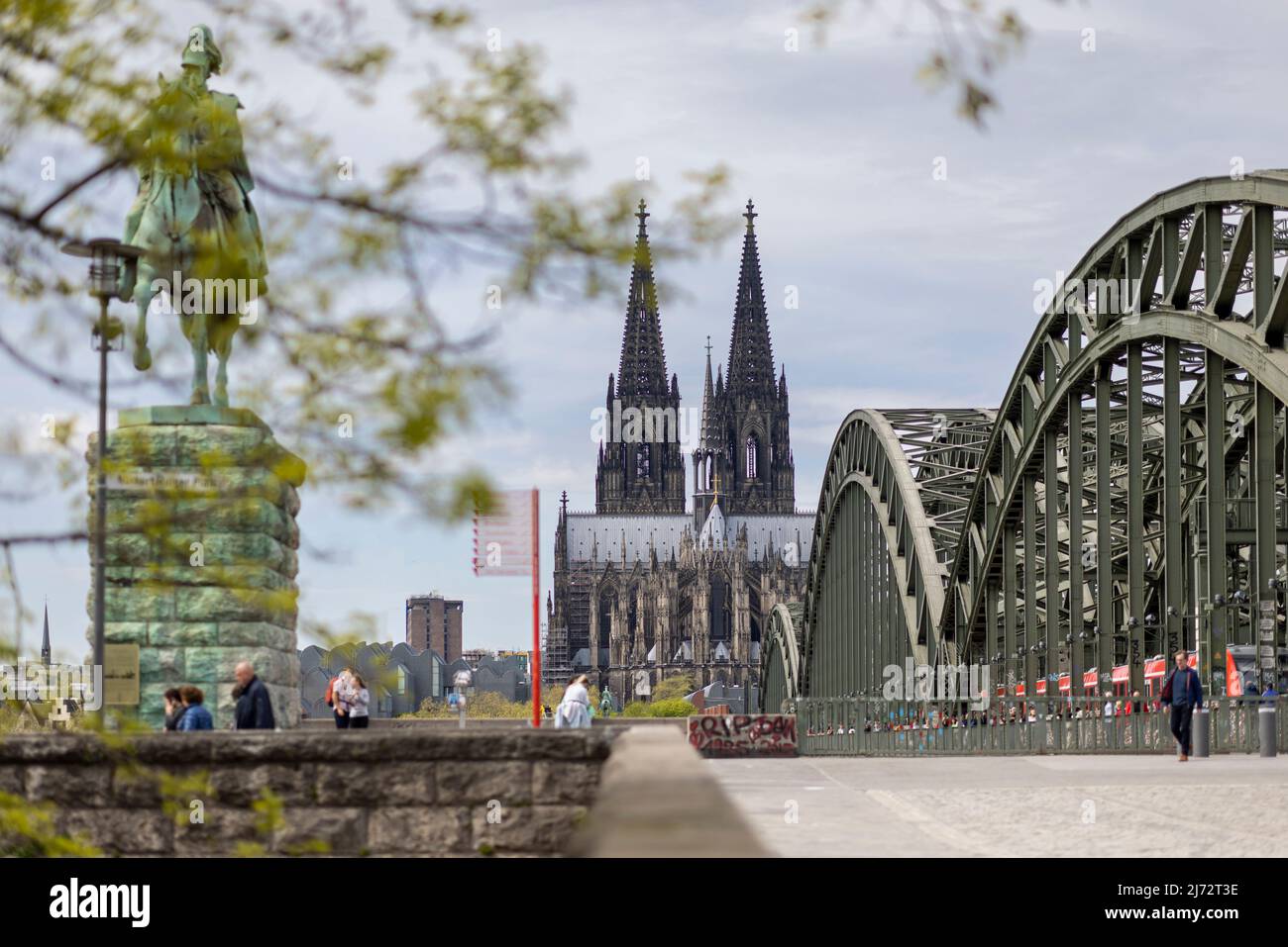 Cologne Cathedral twin towers rising above city skyline on a bright ...