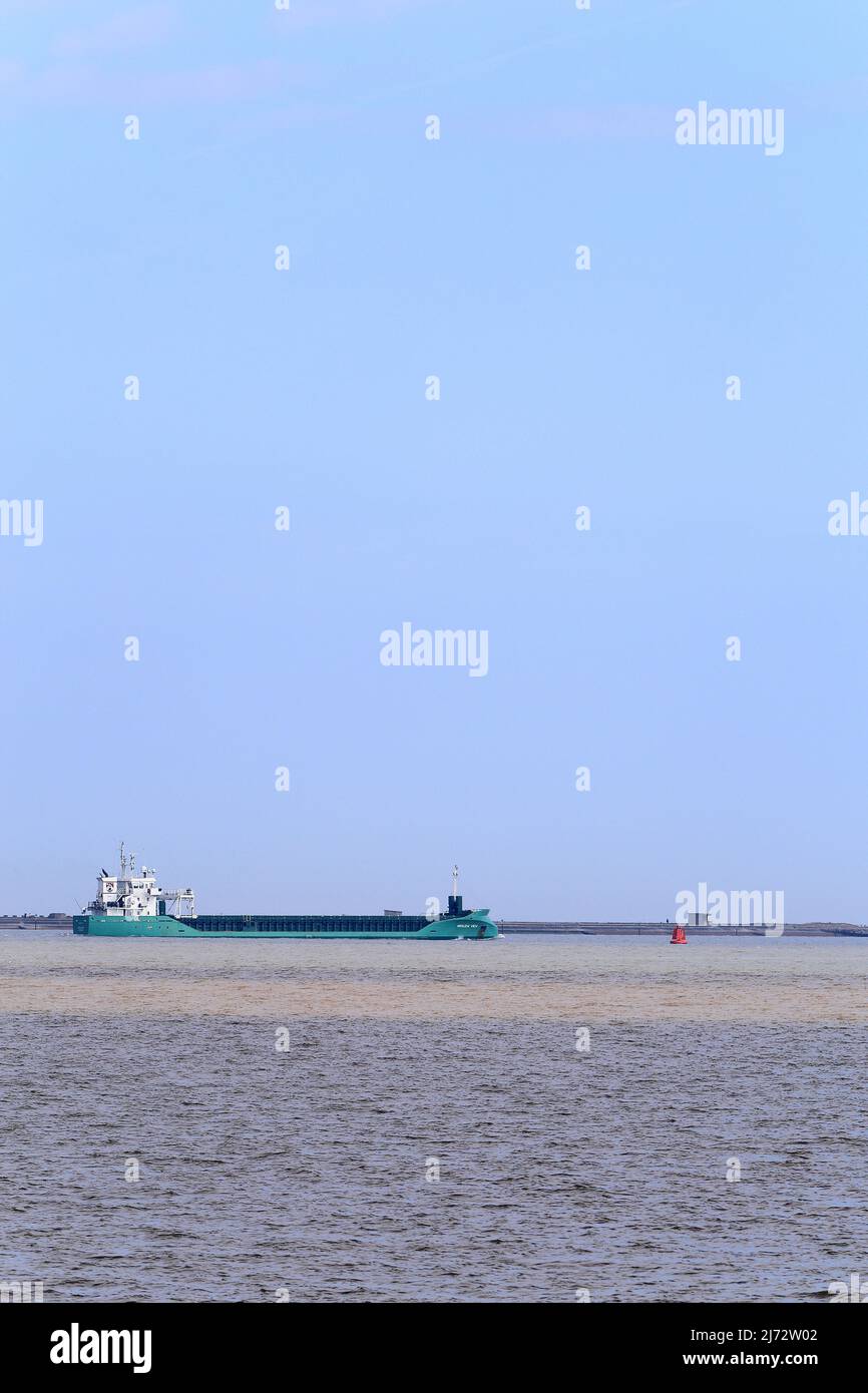 General cargo ship Arklow View leaving the Port of Felixstowe, Suffolk, UK. Stock Photo