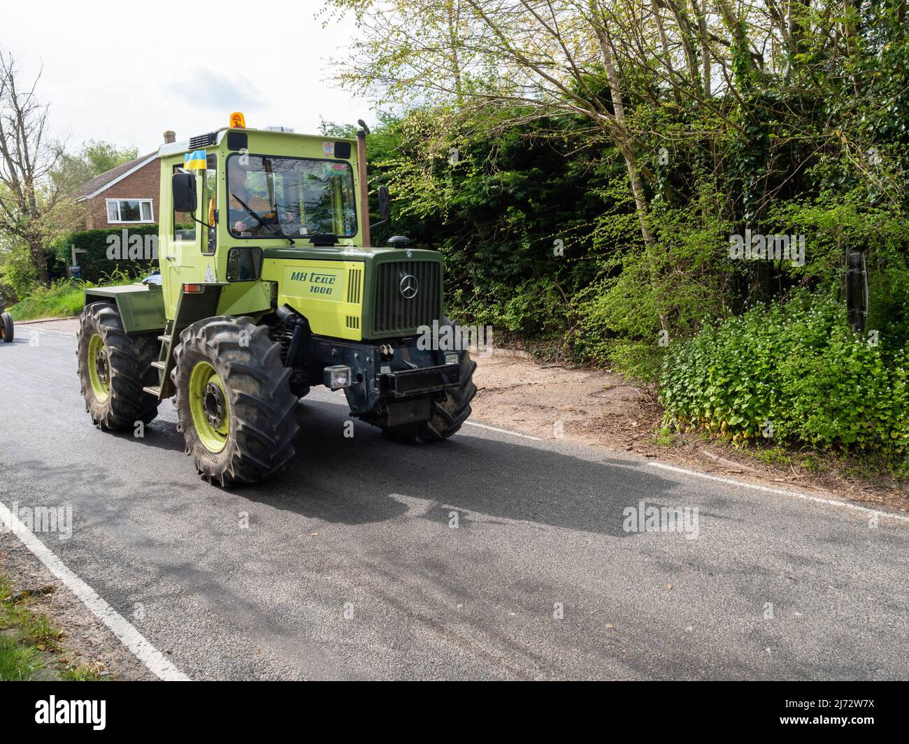 Gt. Bardfield Braintee Essex UK, 2nd May 2022. Stebbing Tractor Run an annual event where old tractors are driven through the Essex countryside.  Tractors are used to pull farm implements. copyright Willliam Edwards/Alamy Stock Photo