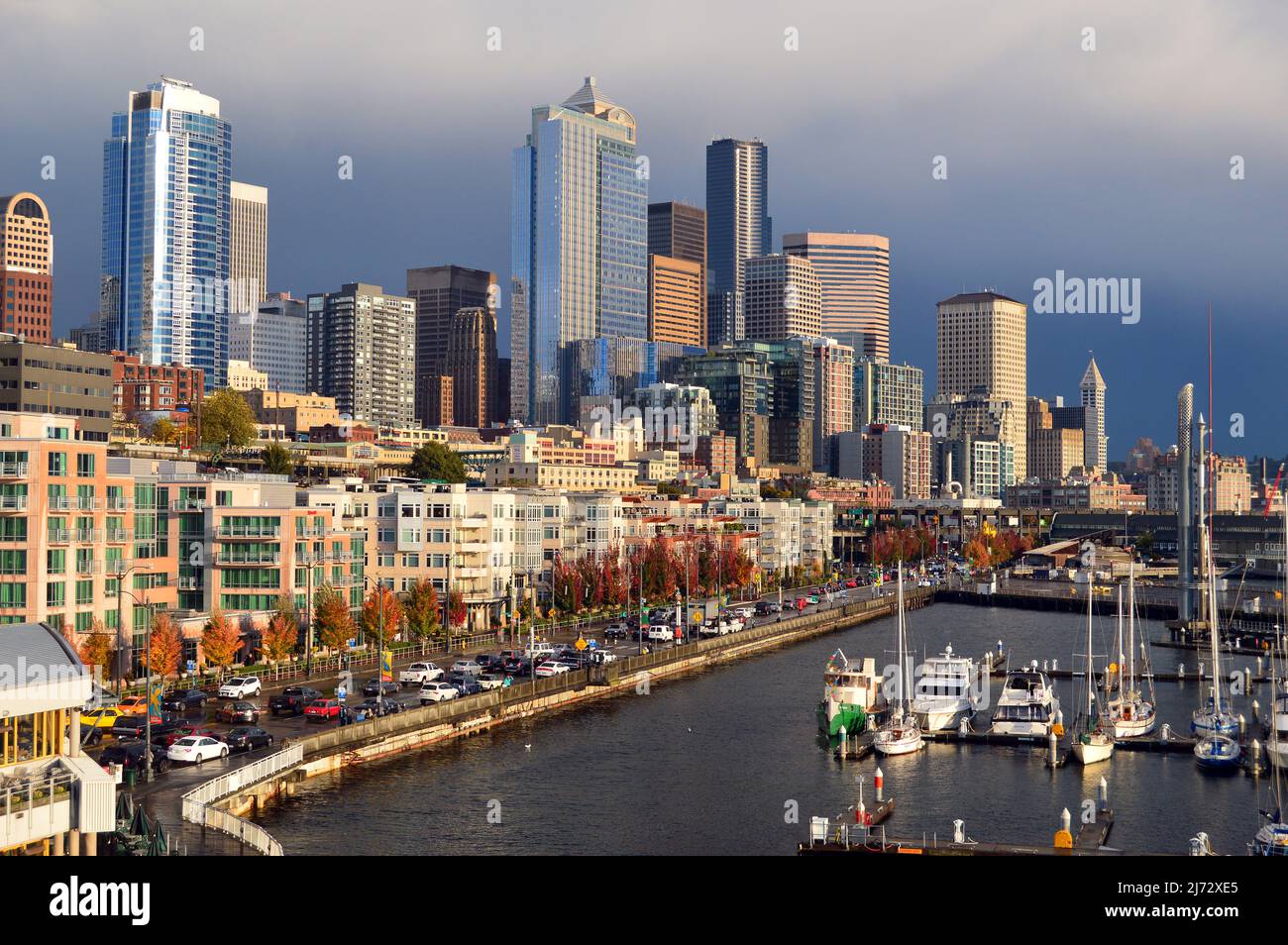 The sun peaks through the clouds in Seattle Stock Photo