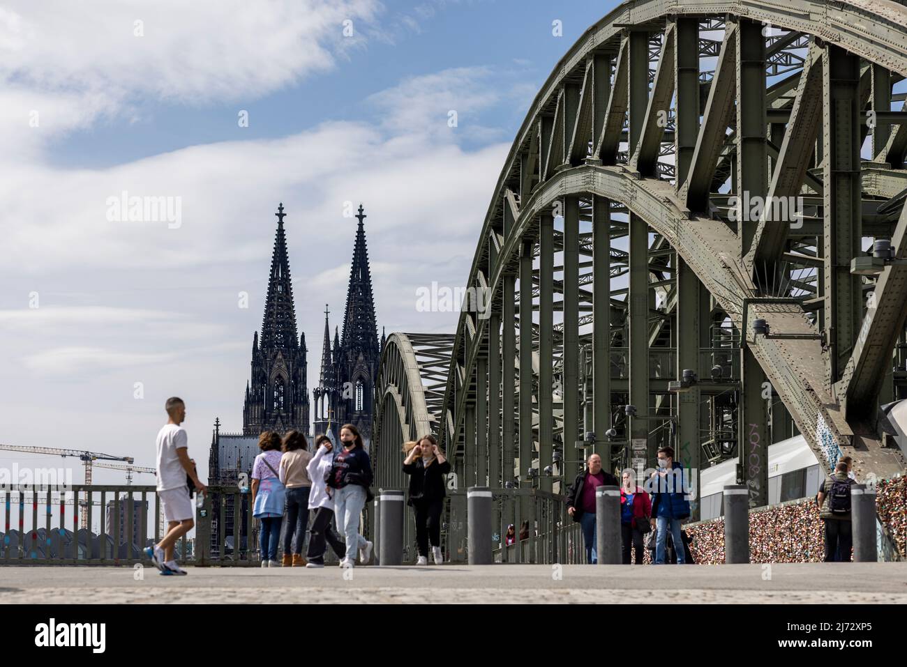 Cologne Cathedral twin towers rising above city skyline on a bright ...