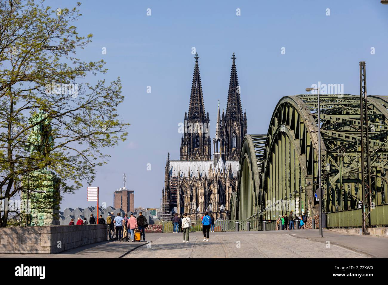 Cologne Cathedral twin towers rising above city skyline on a bright ...