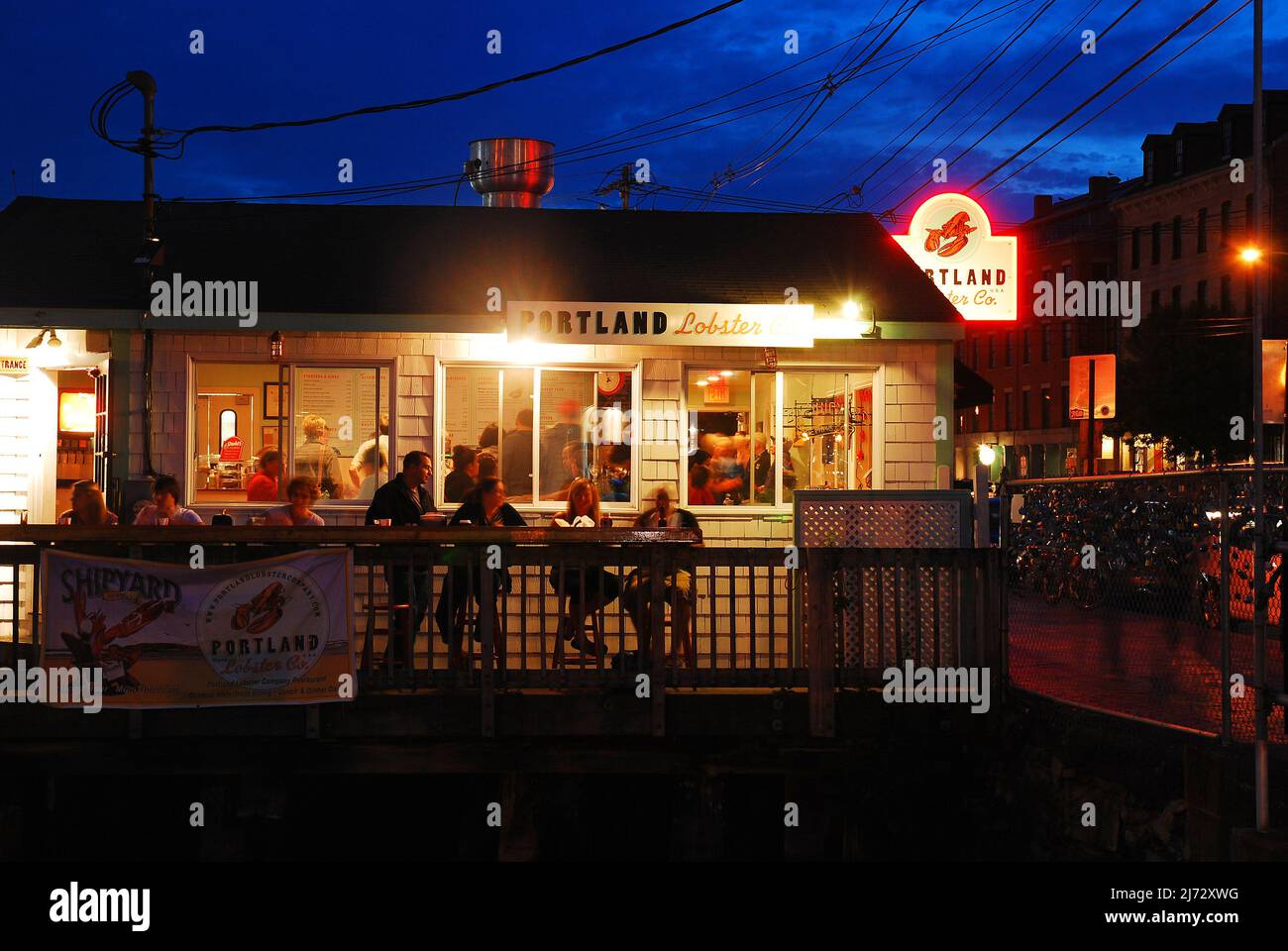 Diners enjoy s summer evening at a lobster shack in Portland, Maine Stock Photo