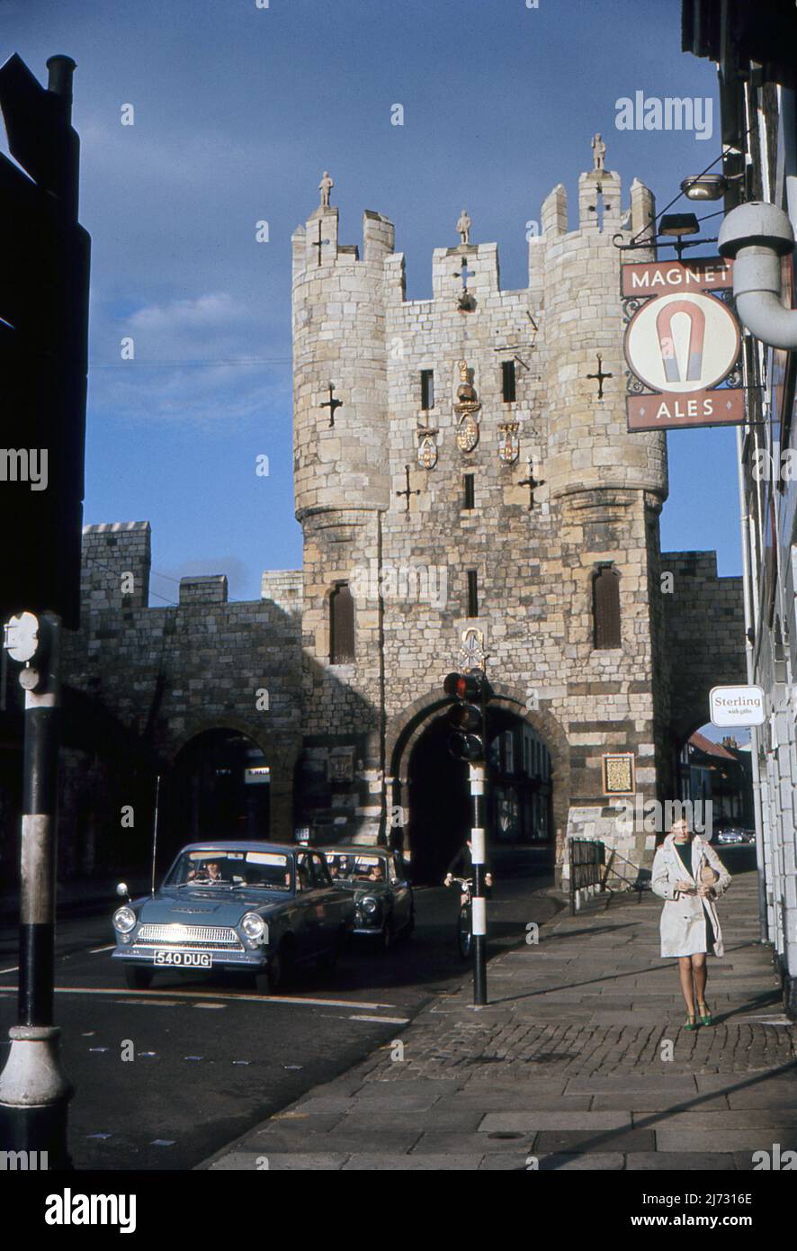 A photograph of Micklegate Bar taken from outside the Punch Bowl public house, Blossom Street, York, North Yorkshire. 1967 The bar was the traditional ceremonial gate for monarchs entering the city. Stock Photo
