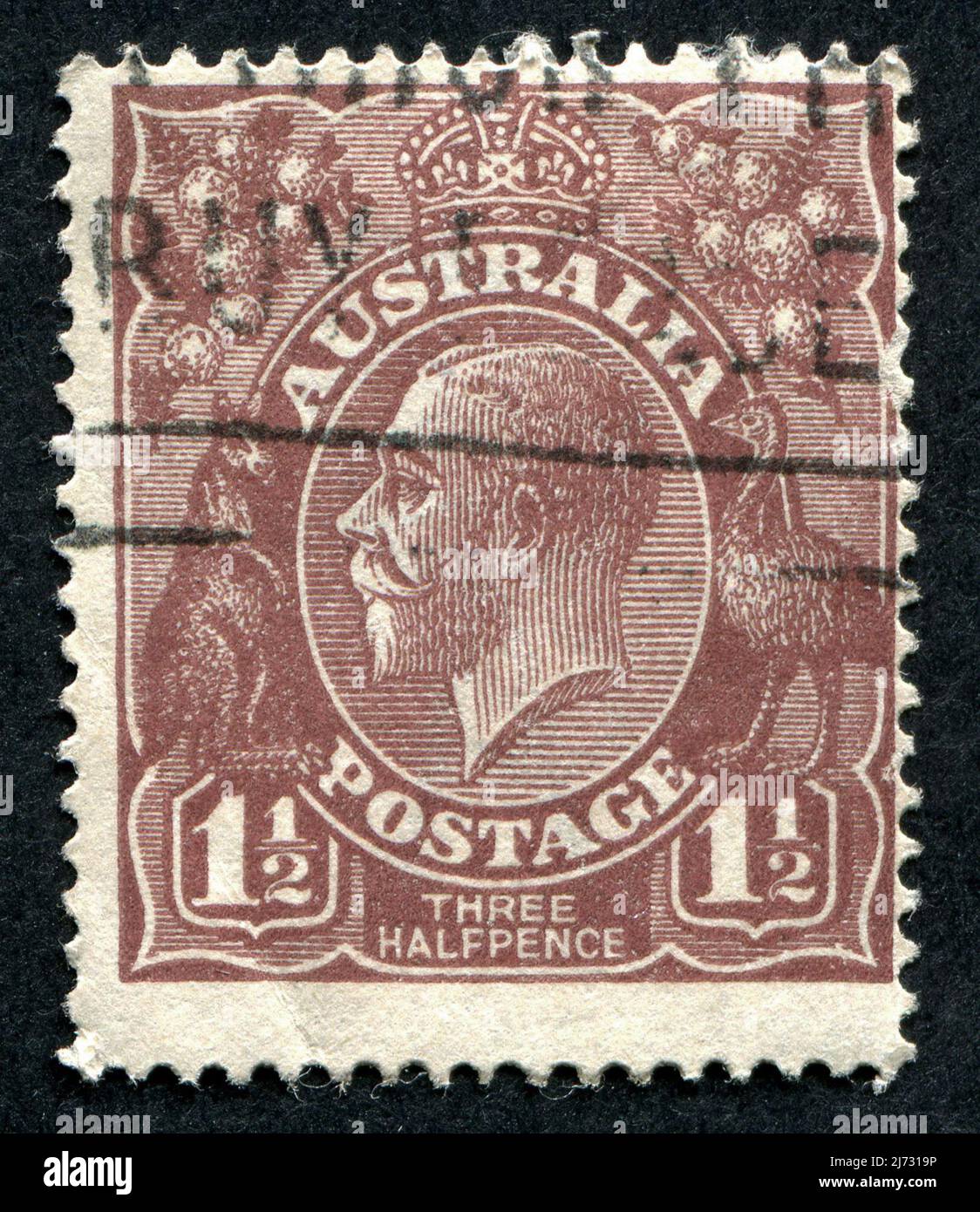 A brown 1 1/2d ‘Three Halfpence’ King V Australian postage stamp
