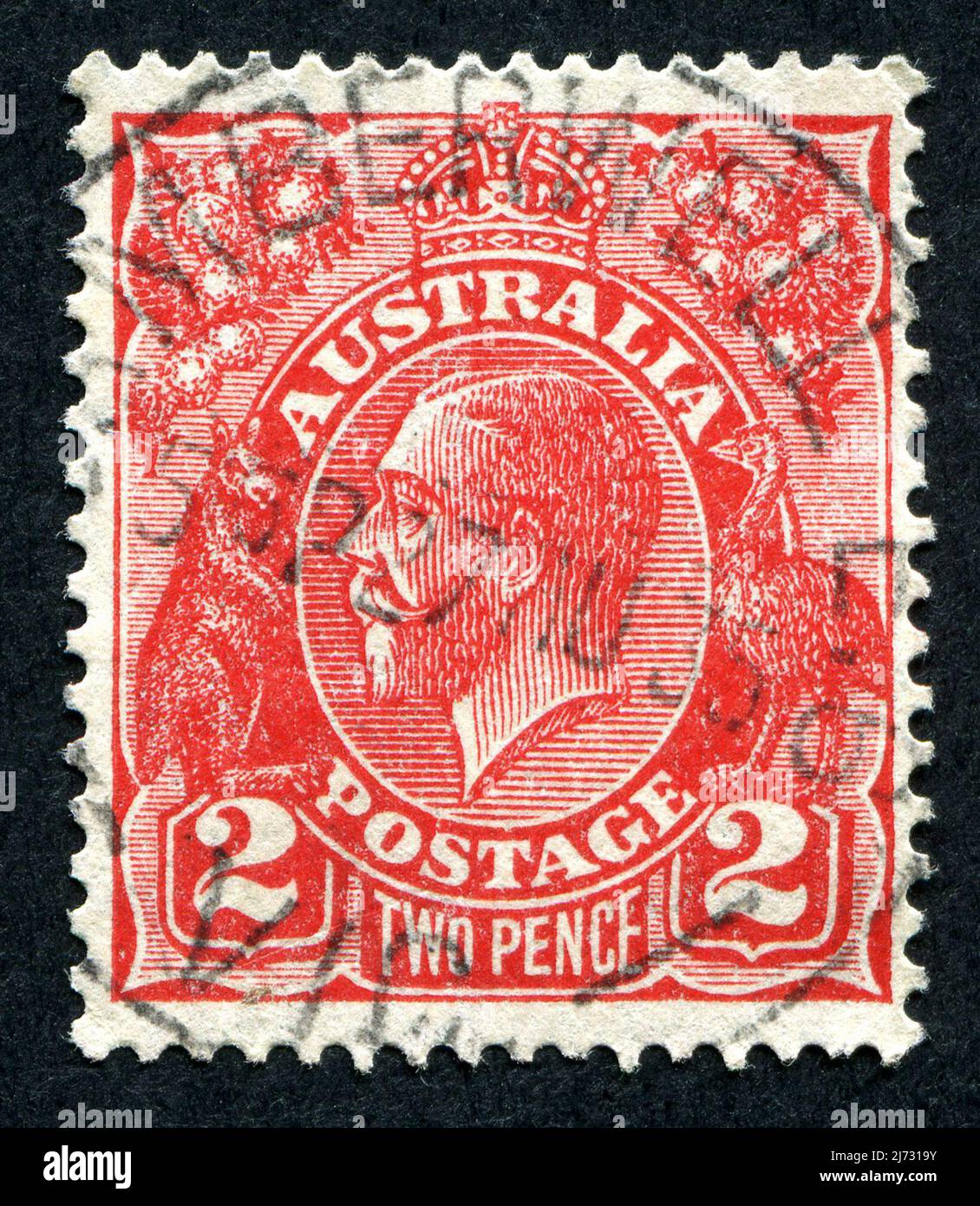 A red 2d ‘Two Pence’ King V Australian postage stamp Stock Photo