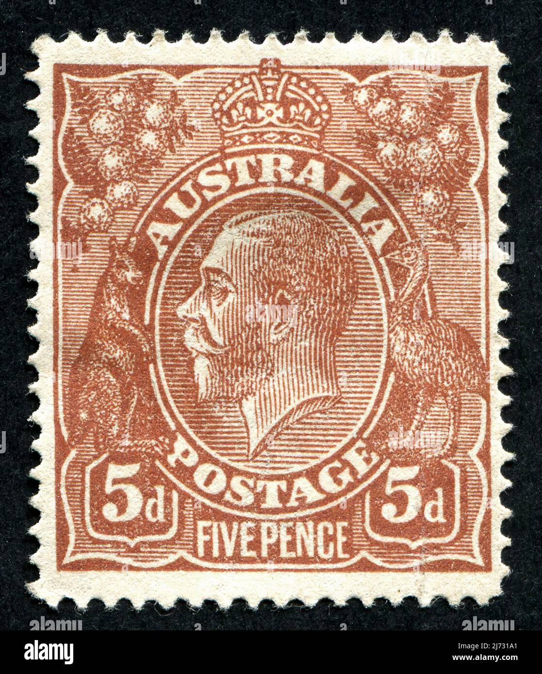 A brown 5d ‘Five Pence’ King V Australian postage stamp Stock