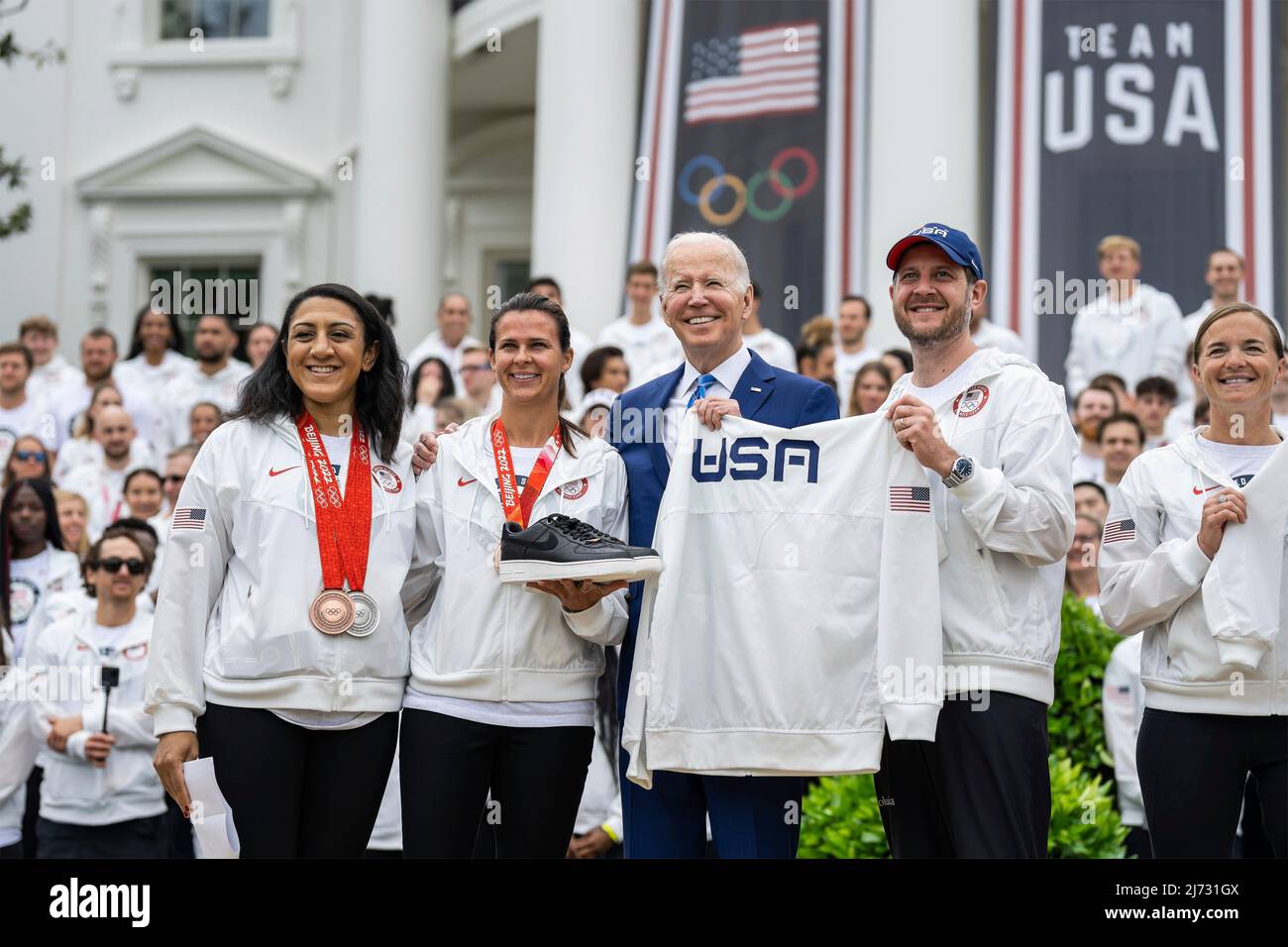 Washington, United States of America. 04 April, 2022. U.S President Joe Biden poses with members of the U.S. Olympic team during an event welcoming the athletes that participated in the Tokyo 2020 Summer Olympic and Paralympics, Beijing 2022 Winter Olympic and Paralympics, on the South Lawn of the White House, May 4, 2022 in Washington, D.C.  Credit: Adam Schultz/White House Photo/Alamy Live News Stock Photo