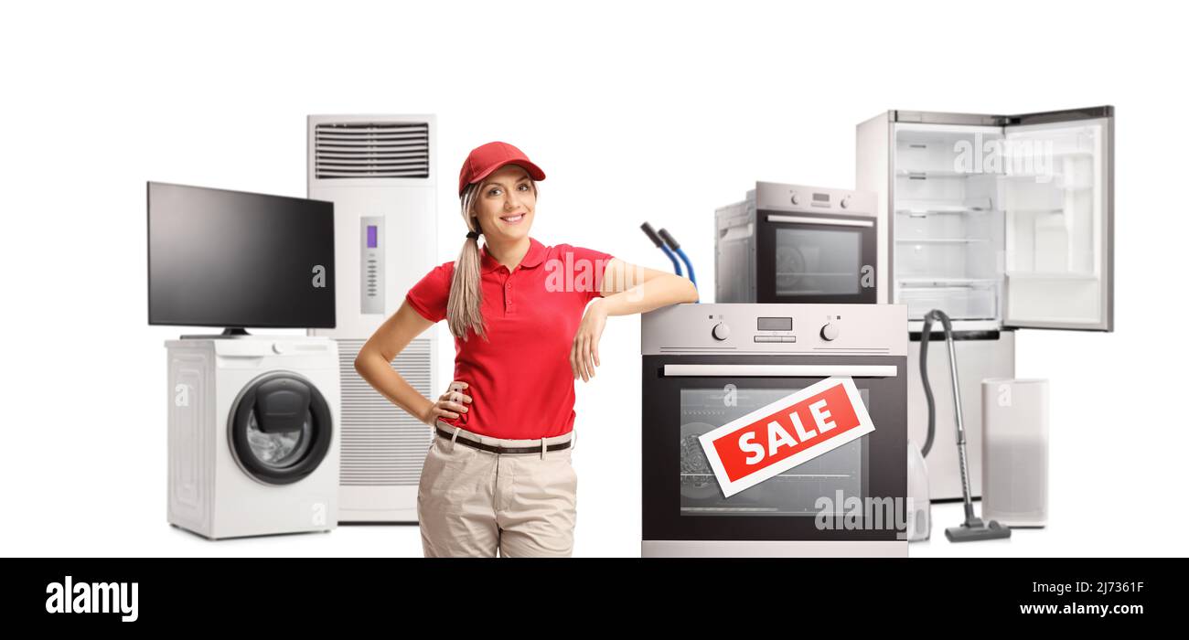 Female sales manager in electrical appliance store isolated on white background Stock Photo