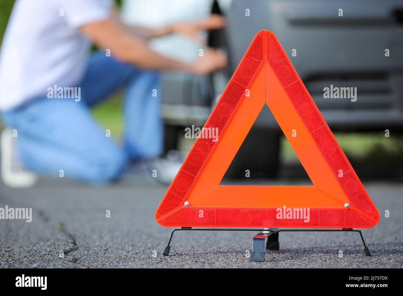 Emergency triangle stop sign on road Stock Photo Alamy