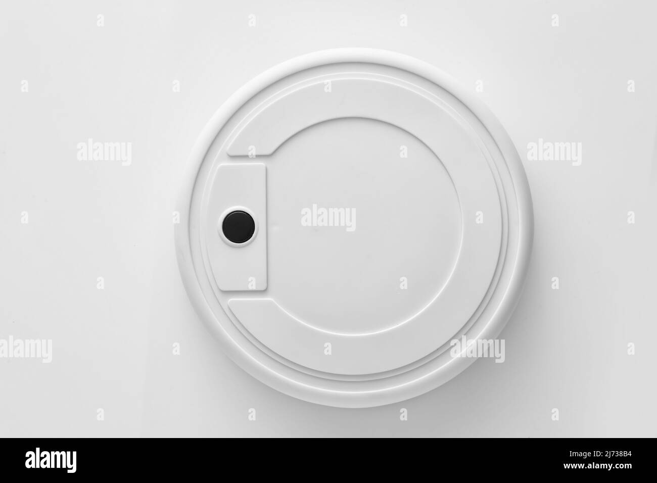Round robot vacuum cleaner on white background Stock Photo Alamy