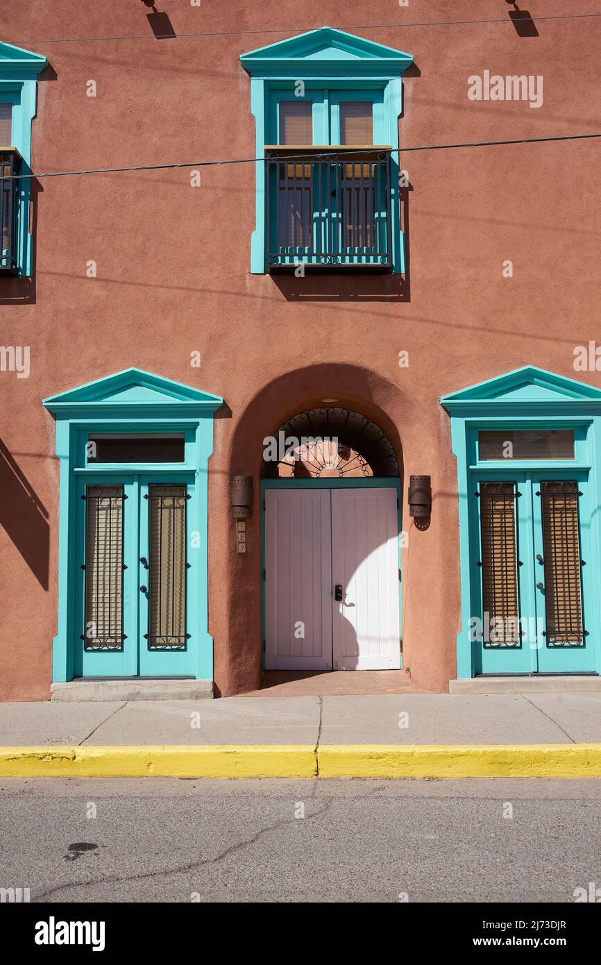 Adobe building with turquoise accents in Santa Fe, New Mexico. Stock Photo