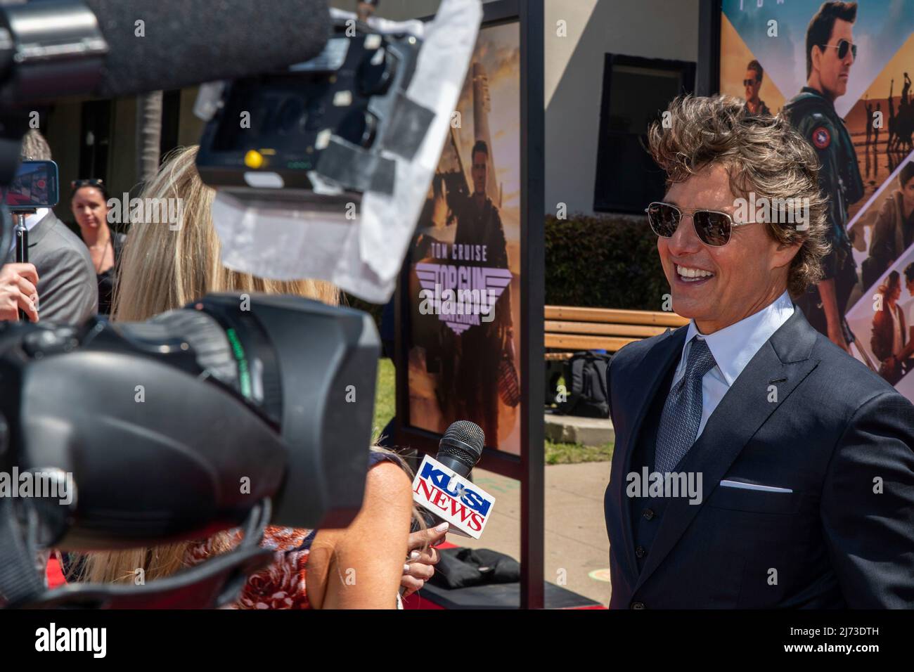San Diego, United States. 04 May, 2022. American actor Tom Cruise is interviewed on the red carpet during the advance movie premiere of Top Gun: Maverick, at Naval Air Station North Island, May 4, 2022 in San Diego, California, Top Gun: Maverick, is the sequel to the 1986 blockbuster, Top Gun and will be released worldwide on May 27.  Credit: MC2 Keenan Daniels/US Navy/Alamy Live News Stock Photo