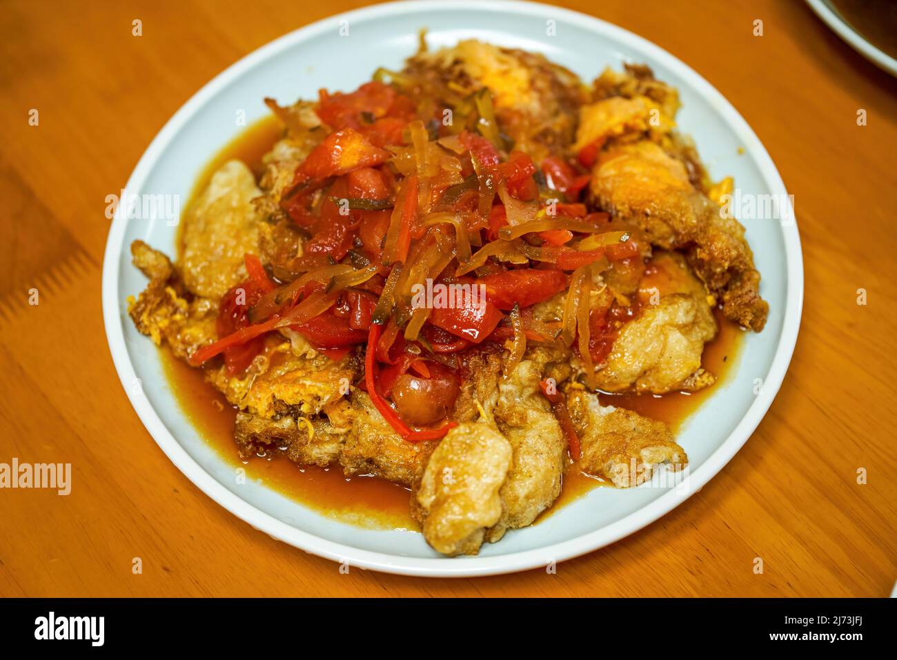 A delicious Chinese homestyle dish, fried eggs with five willows Stock